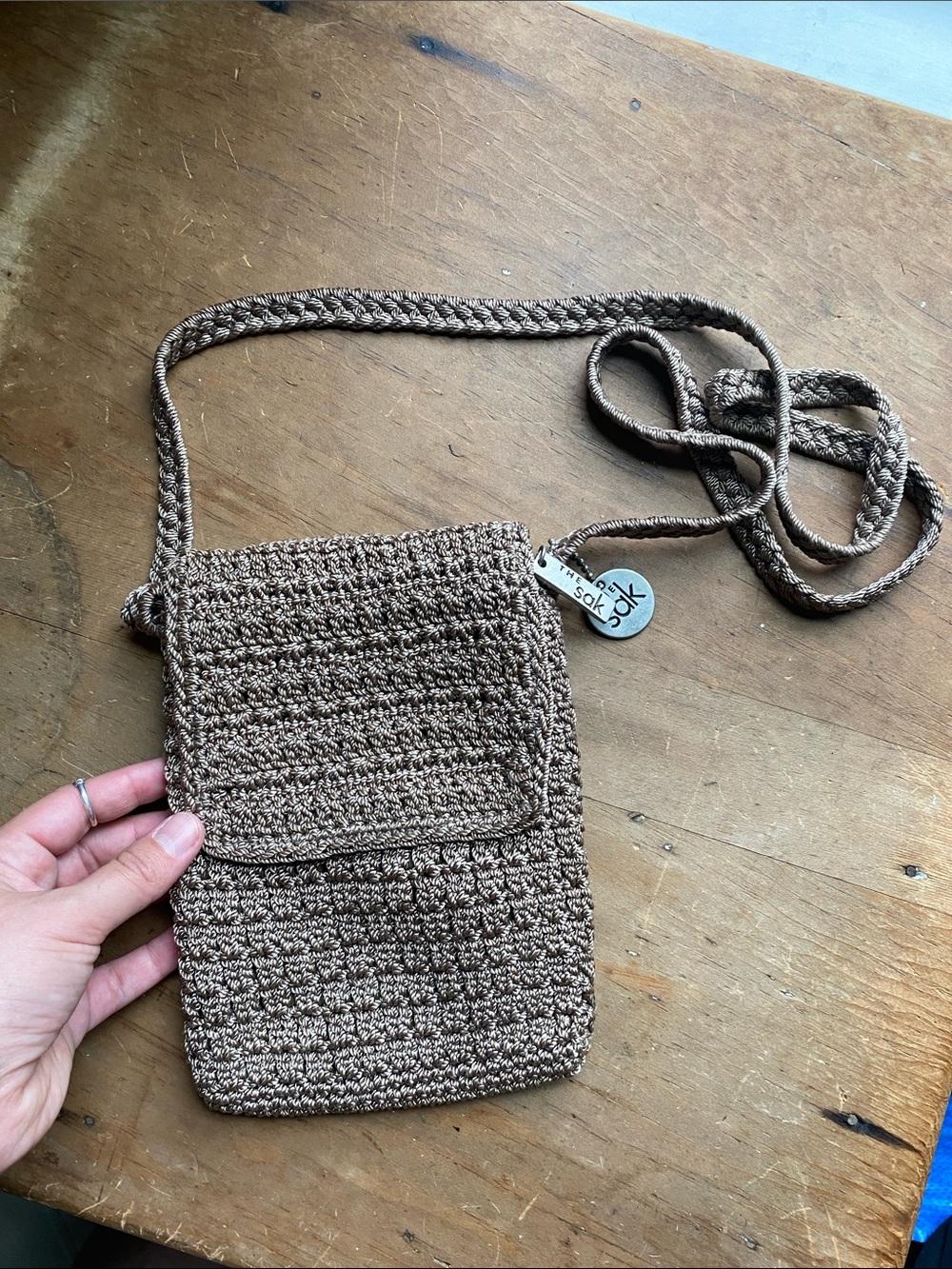 The Sak small crochet crossbody bag in tan